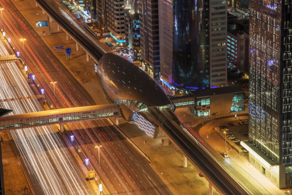 Sheikh Zayed Road traffic and Dubai Metro at night