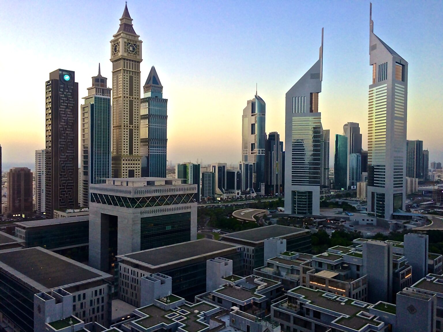 The Gate building of DIFC with Emirates Towers at dawn, Dubai